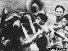 McCain being pulled out of lake 