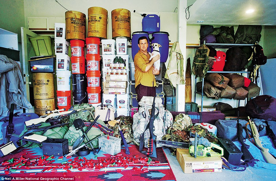 'Prepper' Tim Ralston with his Jack Russell, and surrounded by guns and supplies in his bunker in Phoenix, Arizona. Ralston, who invented the 'Crovel' (see the Survivor's Toolkit below) is one of the stars of Doomsday Preppers 