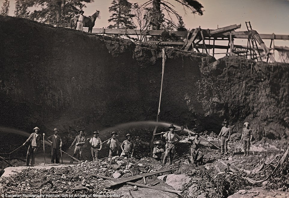 Workers on a hydraulic mining operation in 1854 was captured on a Daguerreotype half plate, documenting the use of high pressure water jets to dislodge hard sediment that would then pass through sluice boxes to extract the gold