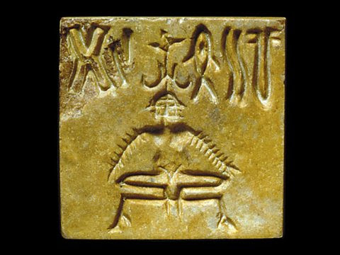 An Indus seal with a three-headed figure