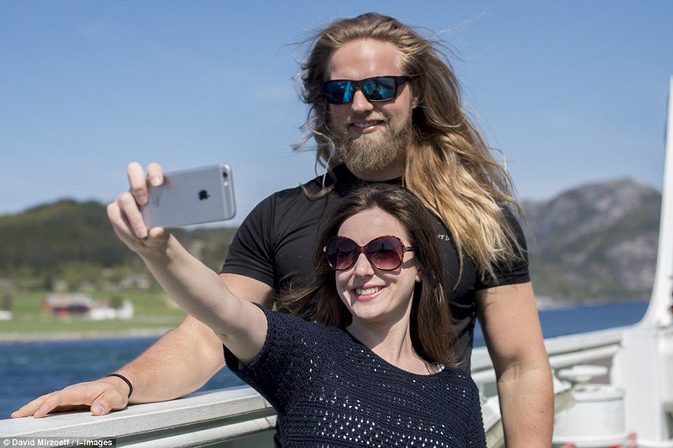Luscious locks: Lasse described how he treats his hair with a conditioning masque but never blow dries it. He had a spare hairband at the ready when his date's hair whipped into her eyes on their date