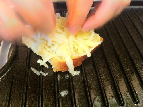 Layering Gruyere Cheese on Slice of Bread