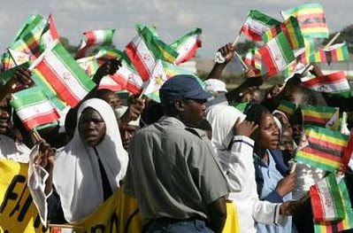Zimbabwe masses gather to greet Iranian President Ahmadinejad who visited the country on April 22, 2010. Iran and Zimbabwe have a close fraternal relationship as anti-imperialist states. by Pan-African News Wire File Photos