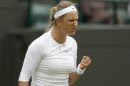 Victoria Azarenka of Belarus reacts during her women's singles tennis match against Maria Joao Koehler of Portugal at the Wimbledon Tennis Championships, in London June 24, 2013. REUTERS/Eddie Keogh