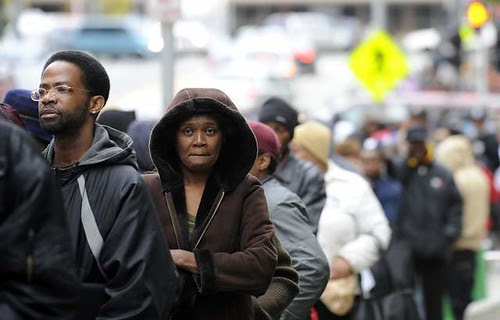 In a desperate attempt to get relief, 50,000 people lined up outside Cobo Conference Center in Detroit to pick up applications for utility and mortgage assistance that will only provide relief for 3,500. The economic crisis in capitalism is worsening. by Pan-African News Wire File Photos