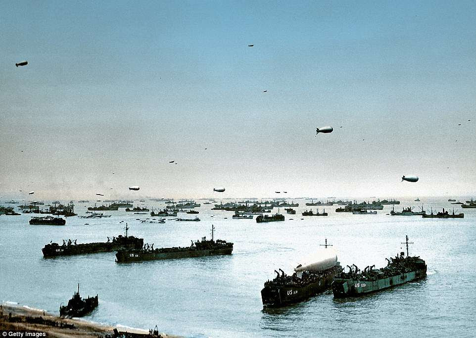 Allied ships, boats and barrage balloons off Omaha Beach after the successful D-Day invasion. The bloody landing cost up to 5,000 Allied soldiers their lives, more than a tenth of the invasion force, but was a key beachhead that led the later victories. With the beach taken, ships move close to shore to unload reinforcements and vehicles