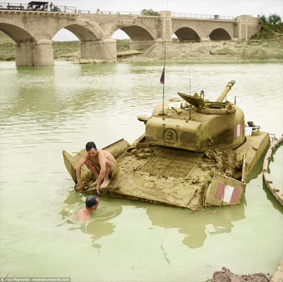 This fascinating photograph shows a submerged Sherman tank being recovered from the River Biferno, near Campo-Marino in Italy, during October 1943. The Allied campaign to destroy fascist Italy began in 1943 and ended in the spring of 1945. There were nearly 1.5million casualties during the bloody struggle, alongside thousands of tanks and aircraft. From September 1943, the Italian Royal Army joined the Allies in the hope of liberating their country from fascism 