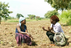 A junior business advisor for TechnoServe discusses farming techniques with a Ugandan farmer. Technoserve is the NGO receiving the most funds from the Gates Foundation. It's a US based NGO that develops “business solutions to poverty”. Running on an $80 million annual budget, it received a total of $85 million from the Gates Foundation during the last decade. Over half of these funds came through a 2007 grant “to help entrepreneurial men and women in poor rural areas of the developing world build business”. Technoserve carries out this work through partnerships with food corporations such as Cargill, Unilever, Coca Cola and Nestlé, who bring “world-class business and industry expertise” and who are offered, through the programme, "new market and sourcing opportunities”.