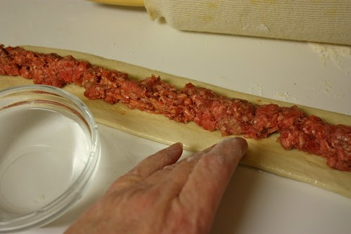 Dampening edges of dough