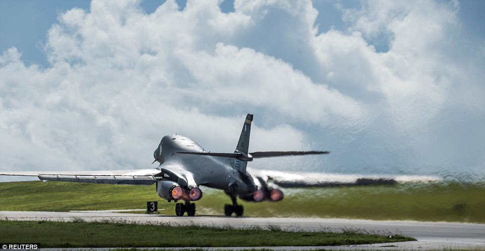 Pictured: A B-1B Lancer bombers taking off from Guam air base yesterday