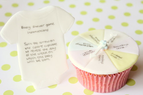 Baby Shower cake game instructions and spinning arrow cupcake.