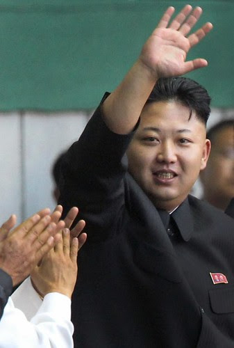 Kim Jong Un arrives at the "Arirang" mass games song-and-dance ensemble, Friday, July 26, 2013 on the eve of the 60th anniversary of the Korean War armistice in Pyongyang, North Korea. by Pan-African News Wire File Photos