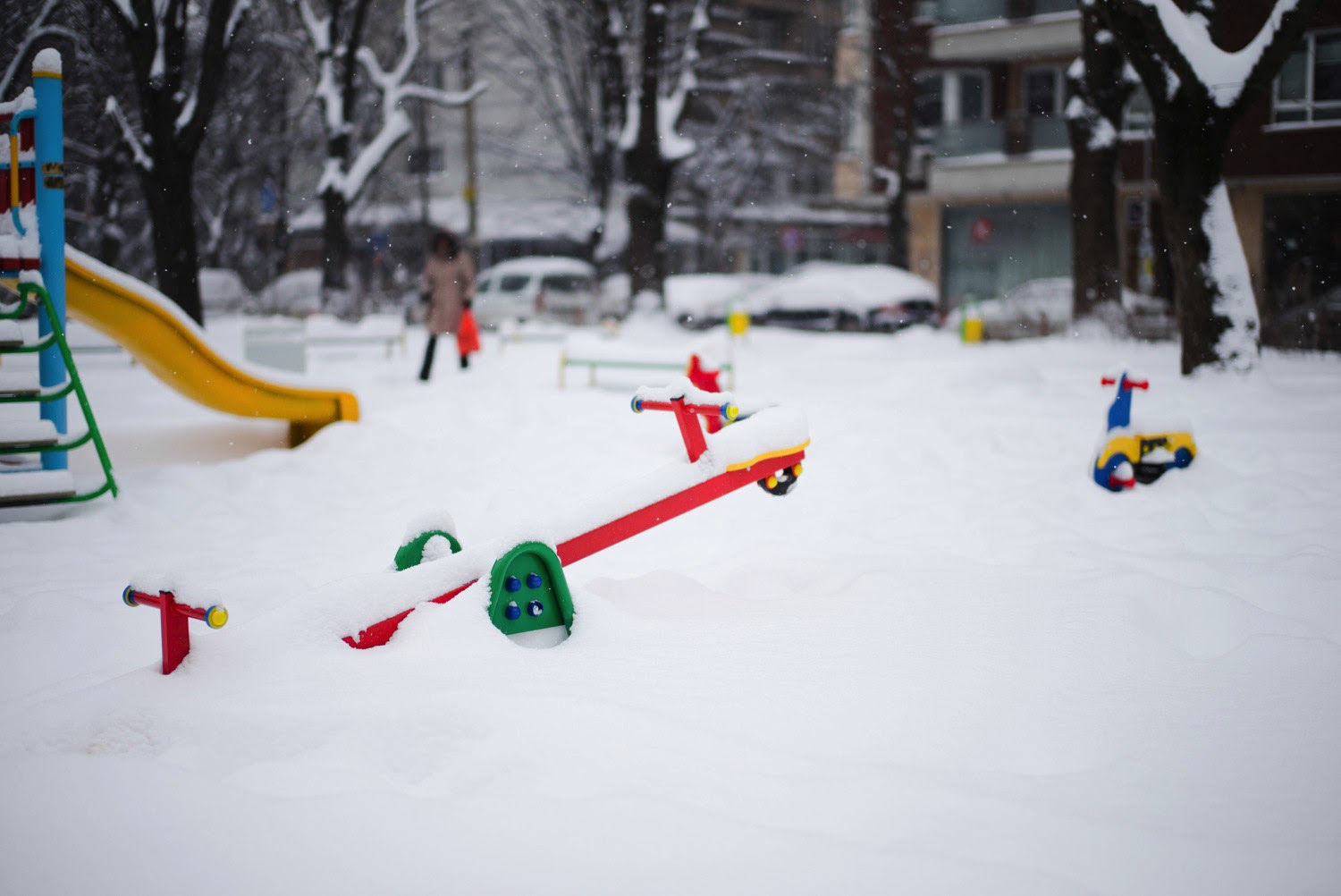 Playground covered with snow