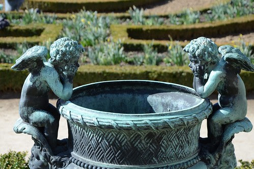 Cherubs, tired of waiting for tulips to grow, Versailles