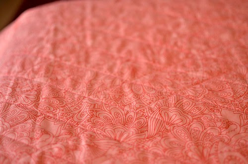 peachy baby quilt back