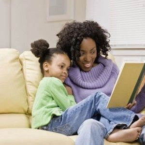 Mom reading books to child
