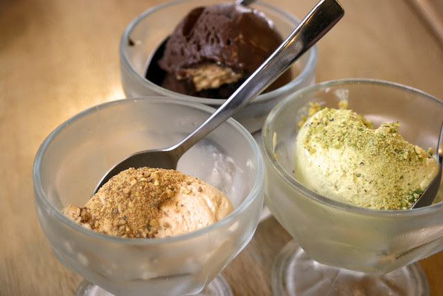 Homemade gelato - hazelnut, dark chocolate with crispy wafer, and pistachio