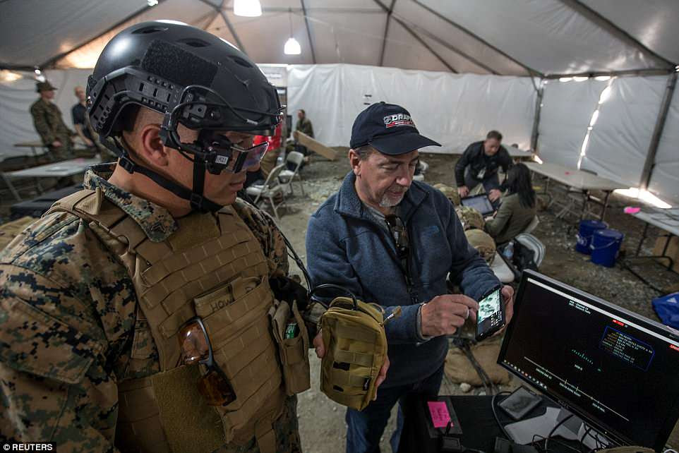 Corporal Dorian Howard attends a class on a Head-Up Display (HUD) during Urban Advanced Naval Technology Exercise 2018
