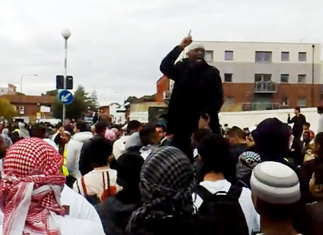 Holding forth: Adebolajo at the rally on the eighth anniversary of September 11 outside Harrow Central Mosque in north London