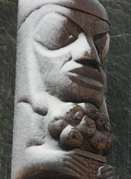 totem figure with snow, Kasaan, Alaska