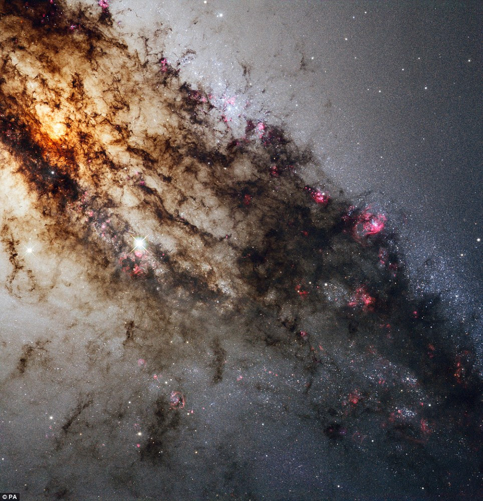 Centaurus A: Scientists believe a super-massive black hole exists at the galaxy's centre which pours out vast amounts of radio energy and X-rays