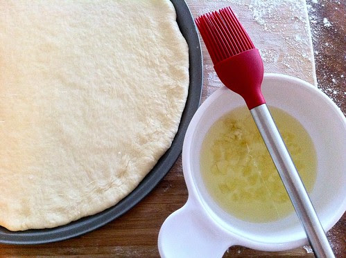 Pizza Crust Ready to be Brushed with Garlic Oil