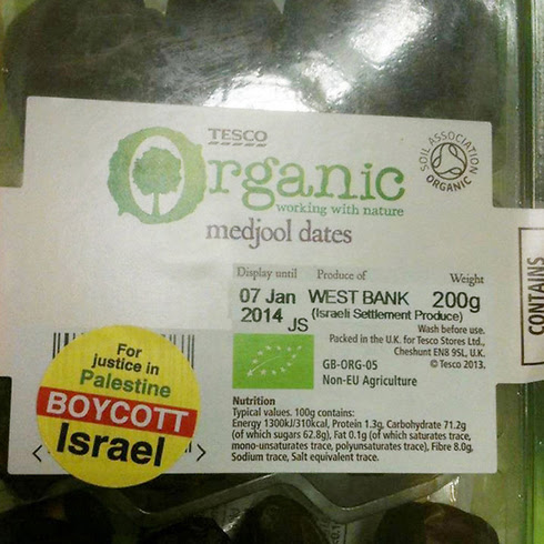 Israeli dates in an Ireland grocery store marked with yellow boycott stickers