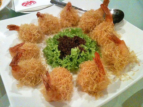 Deep-fried prawn wrapped with homemade sauce and potatoes