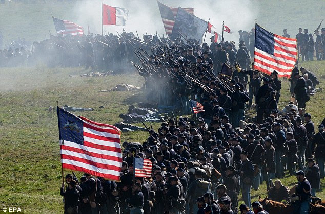 Onward march: Re-enactors portraying Union troops participate in the 150th Anniversary Reenactment of the Civil War Battle of Antietam at Legacy Manor Farm 