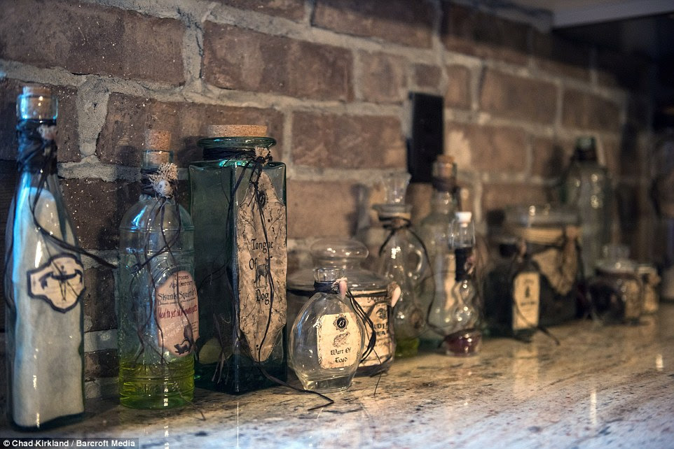 Hubble bubble, toil and trouble: True to the Elder Scrolls: Skyrim computer game, Mr Kirkham's basement also contains an alchemy lab along with a set of potion and poison bottles (pictured)