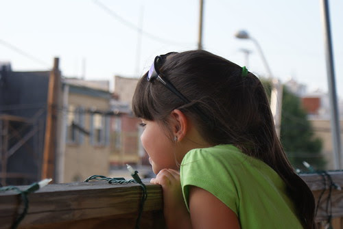 Peering over.