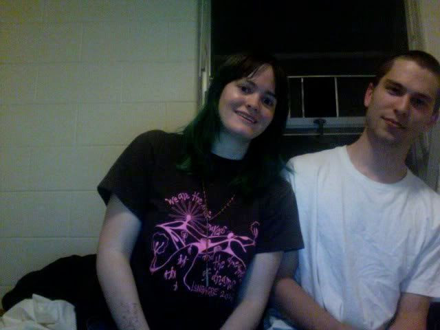 picture of Noah leaning to the left, as I lean in his direction smiling.