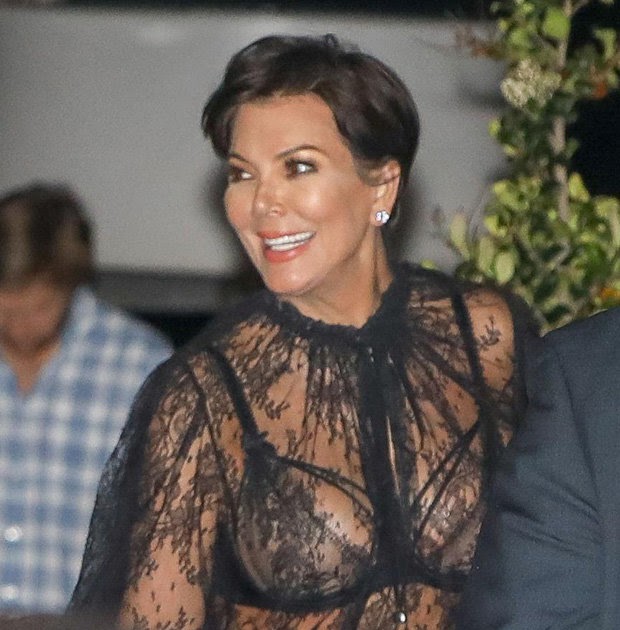 Kris Jenner exposes everything in see-through lace top.