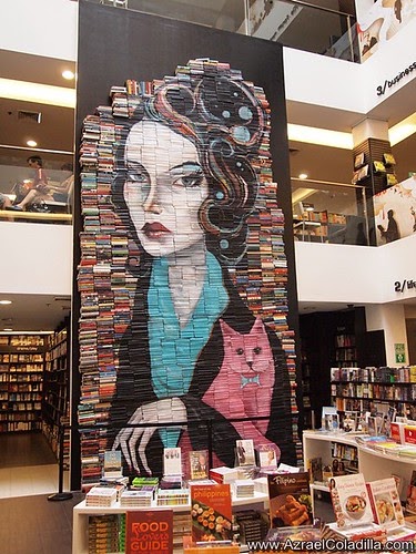 A wall of books as painting canvas displayed in Fully Booked BHS