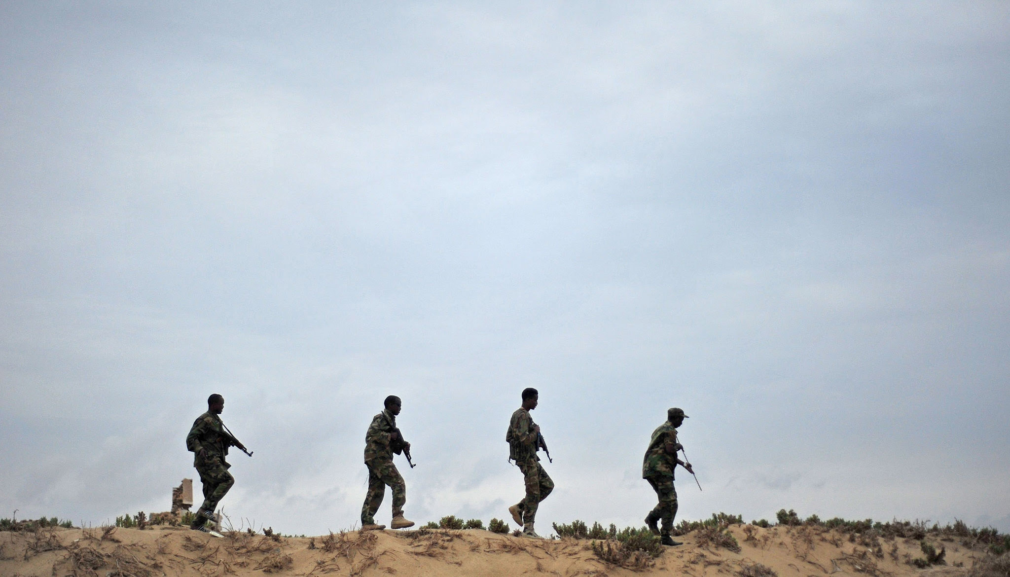Somali security forces patrol along the coast of Qaw, in Puntland, northeastern Somalia on December, 18, 2016. Armed militants groups have become more active in the Puntland's region, northern Somalia, since being pushed out of their strongholds in southern Somalia by African Union forces and the Somali National Army. / AFP PHOTO / Mohamed ABDIWAHABMOHAMED ABDIWAHAB/AFP/Getty Images