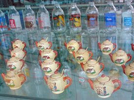 Manorware teapots and painted milk bottles
