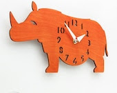 The "Rotund Rhino in Orange" designer wall mounted clock from LeLuni - LeLuni The "Rotund Rhino in Orange" designer wall mounted clock from LeLuni - LeLuni