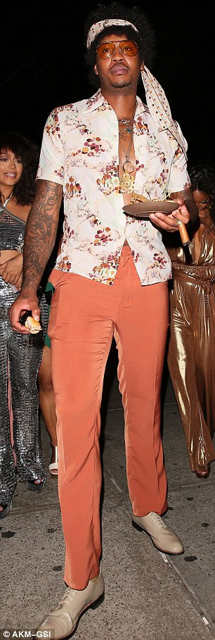 Got that soul: Carmelo Anthony and La La Anthony threw themselves into the theme
