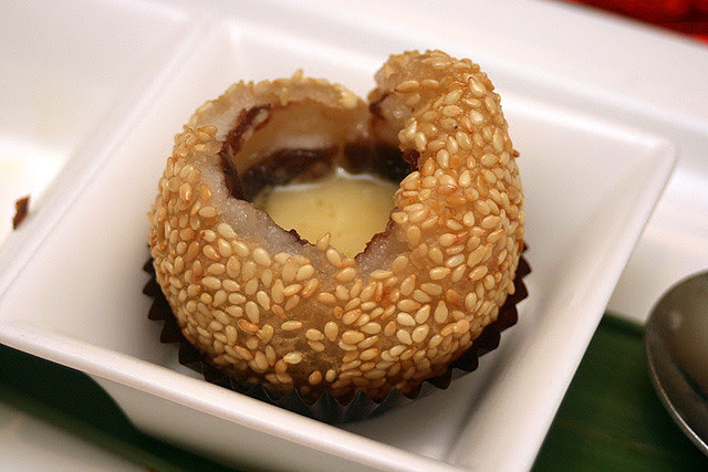 Sesame coated glutinous rice ball with champagne truffle inside! Very heady!
