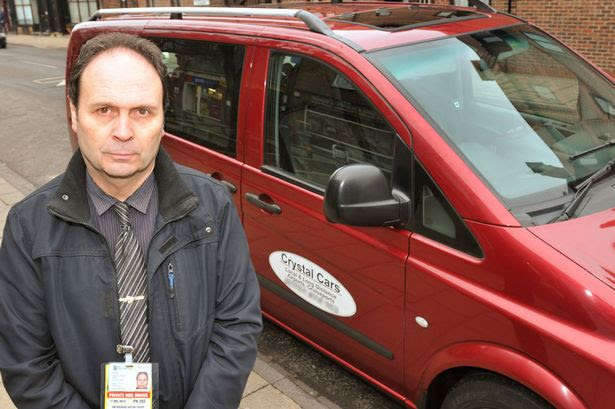 Private hire driver Tony Kemp says he was suspended from taking children to school after he was seen kissing and hugging two young girls who were his own daughters