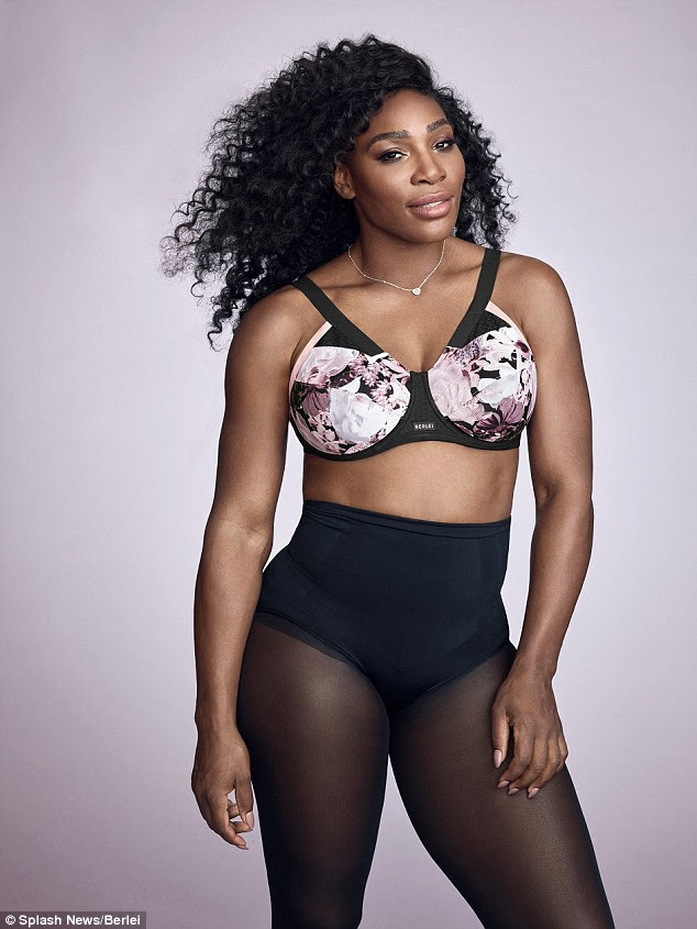 Toned: Ela mais tarde trocou para um sutiã floral rosa esportes como ela enfrentou na frente em seu próximo tiro, adicionando um toque feminino e exibindo seu abs ondulando mais claramente para a câmera