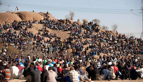 South African workers at the Lonmin strike area where platinum is extracted. Violence in the mines has resulted in over 40 deaths in August 2012. by Pan-African News Wire File Photos