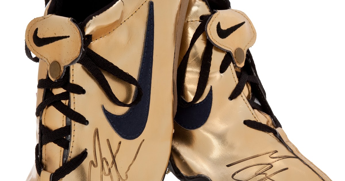 michael johnson gold sneakers
