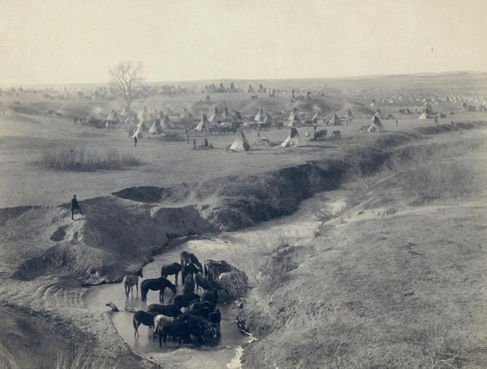 Indian camp: Home of the Lakota (Sioux) tribe pictured in 1891 near the Pine Ridge reservation with a watering hole called White Clay Creek