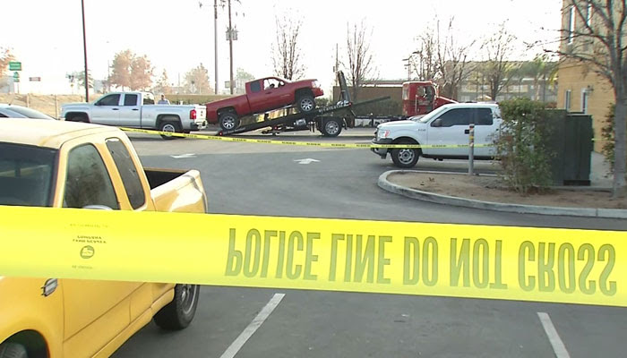 Police gather evidence at the scene where the woman took her life on Friday. (Source: KBAK/CNN)