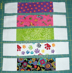 Sew Background rectangles to each side of each strip