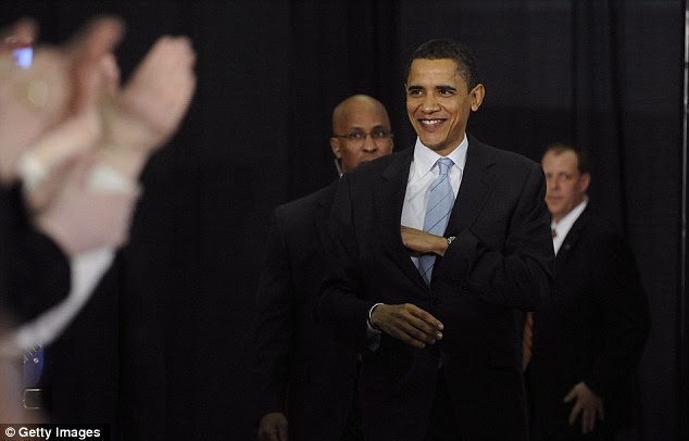 Knowing smile: Then-presidential hopeful Obama attends a rally at the Community College of Beaver County in Pennsylvania in 2008