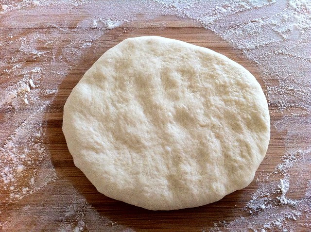 Pizza Dough Patted Out with Fingers