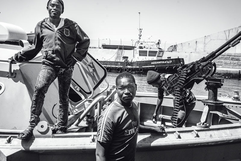 actualidad, cazador de refugiados, libia, xlsemanal