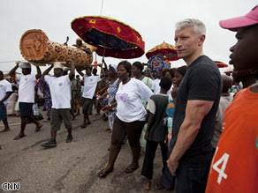 Anderson Cooper joins a parade to celebrate the appointment of a new Chief on the Cape Coast of Ghana.